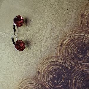 Liz Palacios earrings, coral colored stone